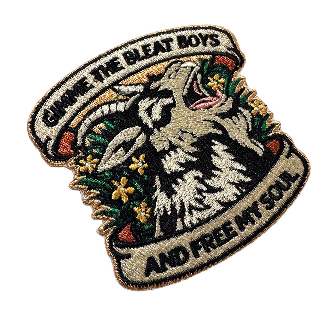 Embroidered patch with an eagle design and text on a white background