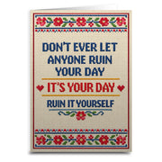 Motivational quote card with floral border on a white background