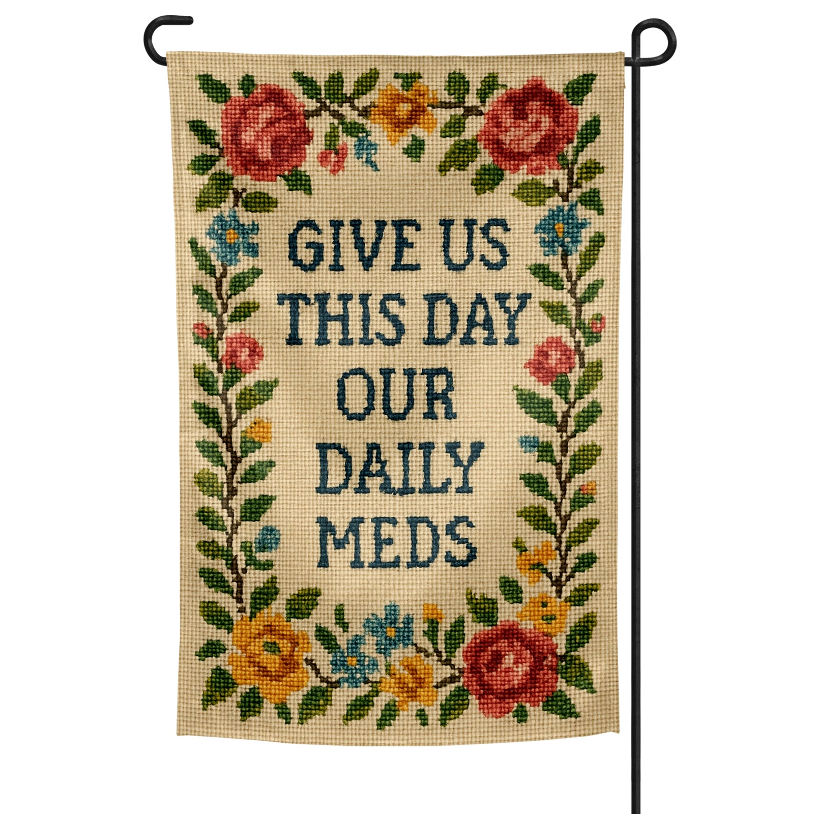 Decorative garden flag with floral design and text 'Give us this day our daily meds' on a white background.