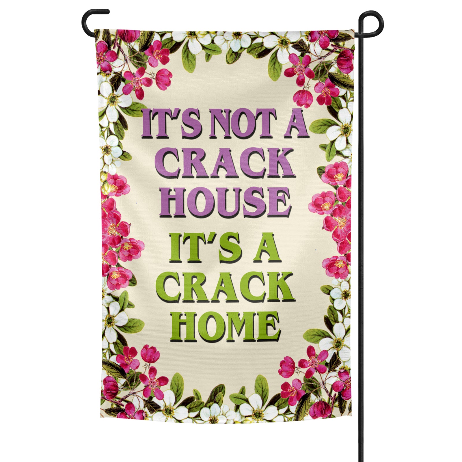 A rectangular garden flag with a floral border and a central text that reads 'IT'S NOT A CRACK HOUSE IT'S A CRACK HOME' in capital letters.