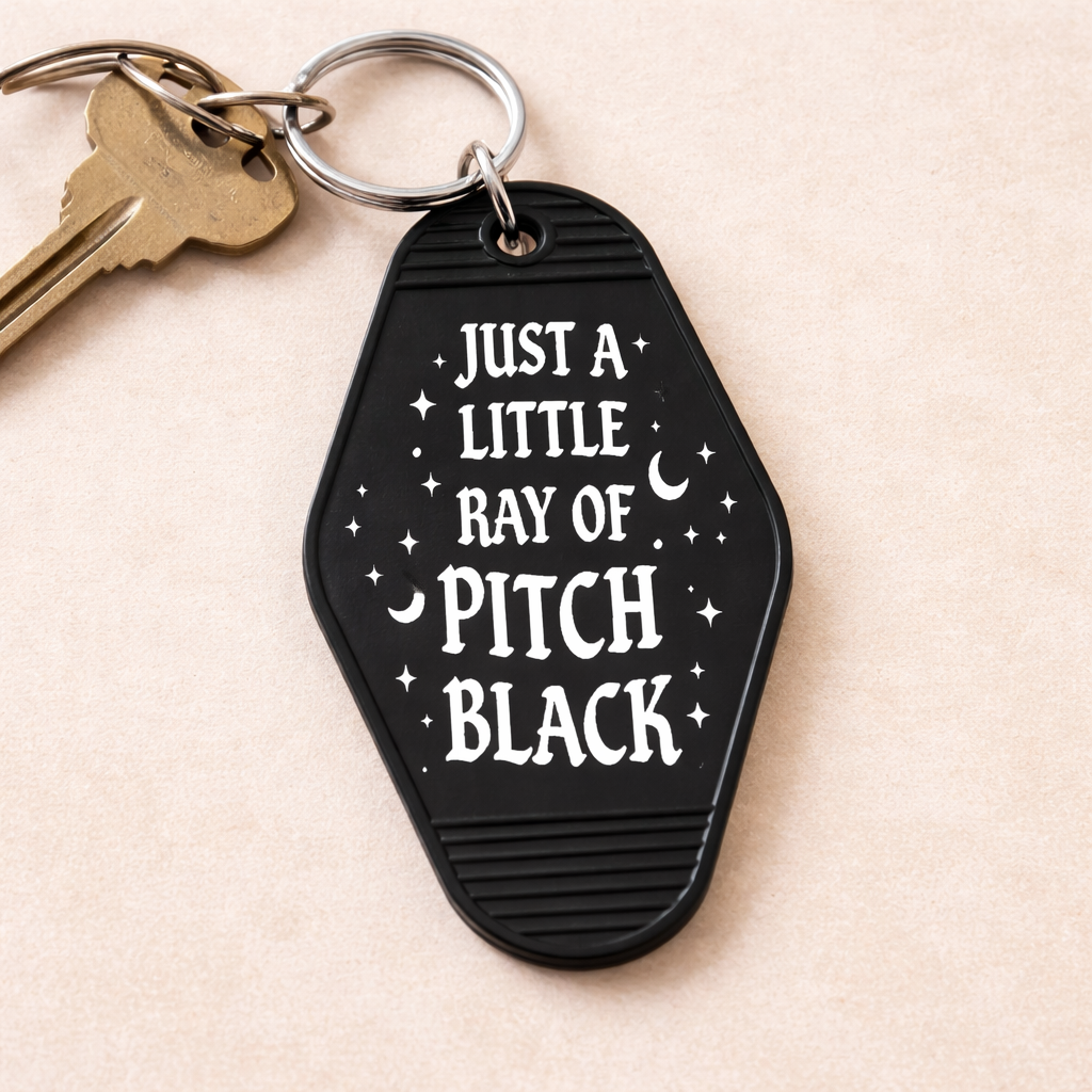 Just a Little Ray of Pitch Black Room Keychain - Shady Front