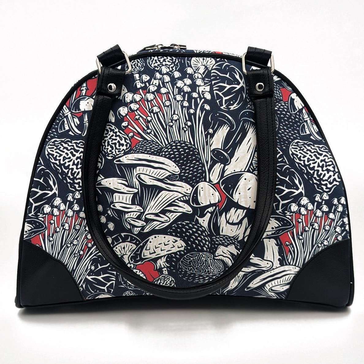 A black handbag with a multicolored mushroom pattern on the side, featuring foam padding and premium zippers.