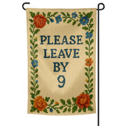 Decorative garden flag with floral border and text 'Please Leave By 9' on a white background.