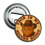 Cat wearing a cowboy hat with 'This is my Second Rodeo' text on a bottle opener