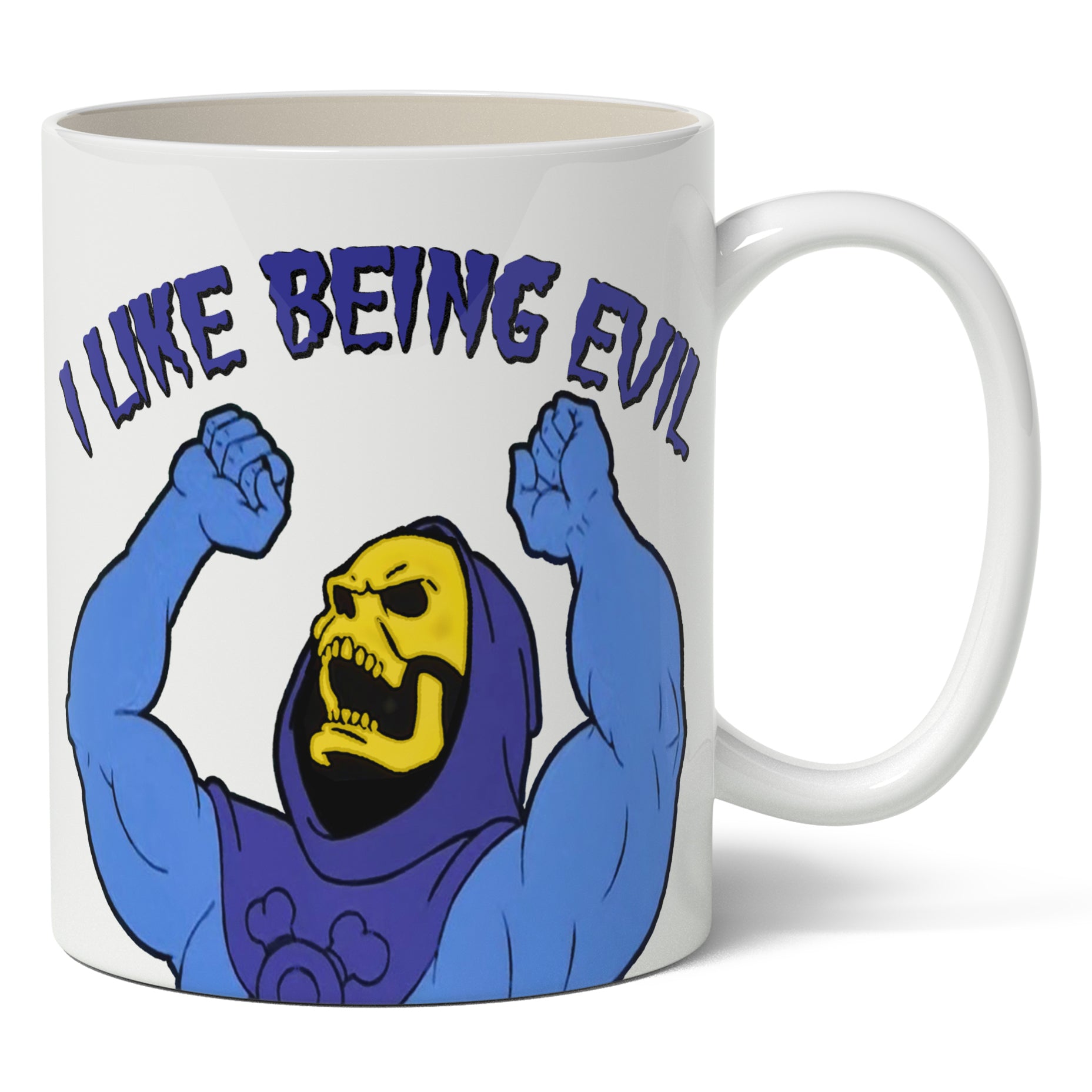 A white ceramic mug with an illustration of the character Skeletor from Masters of the Universe with the phrase 'I LIKE BEING EVIL' on it.
